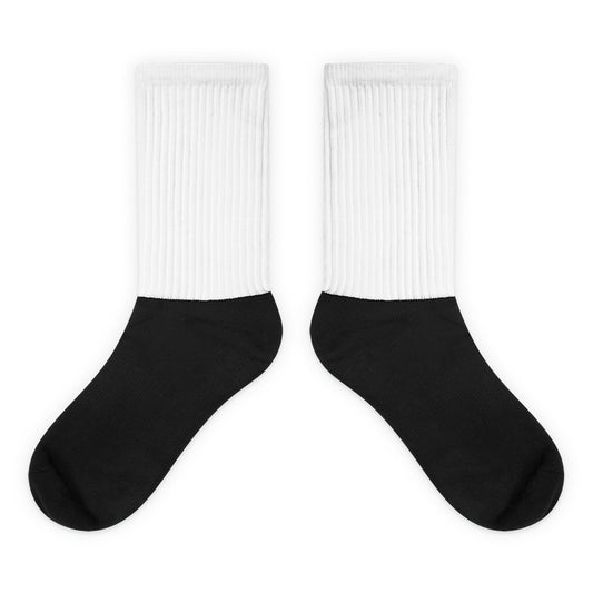 Black and white Christian socks with Lamb of God graphic and “the living GOD” text in red and black on the side