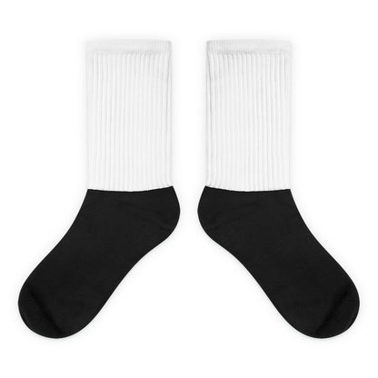 Black and white Christian socks with Lamb of God graphic and “the living GOD” text in red and black on the side