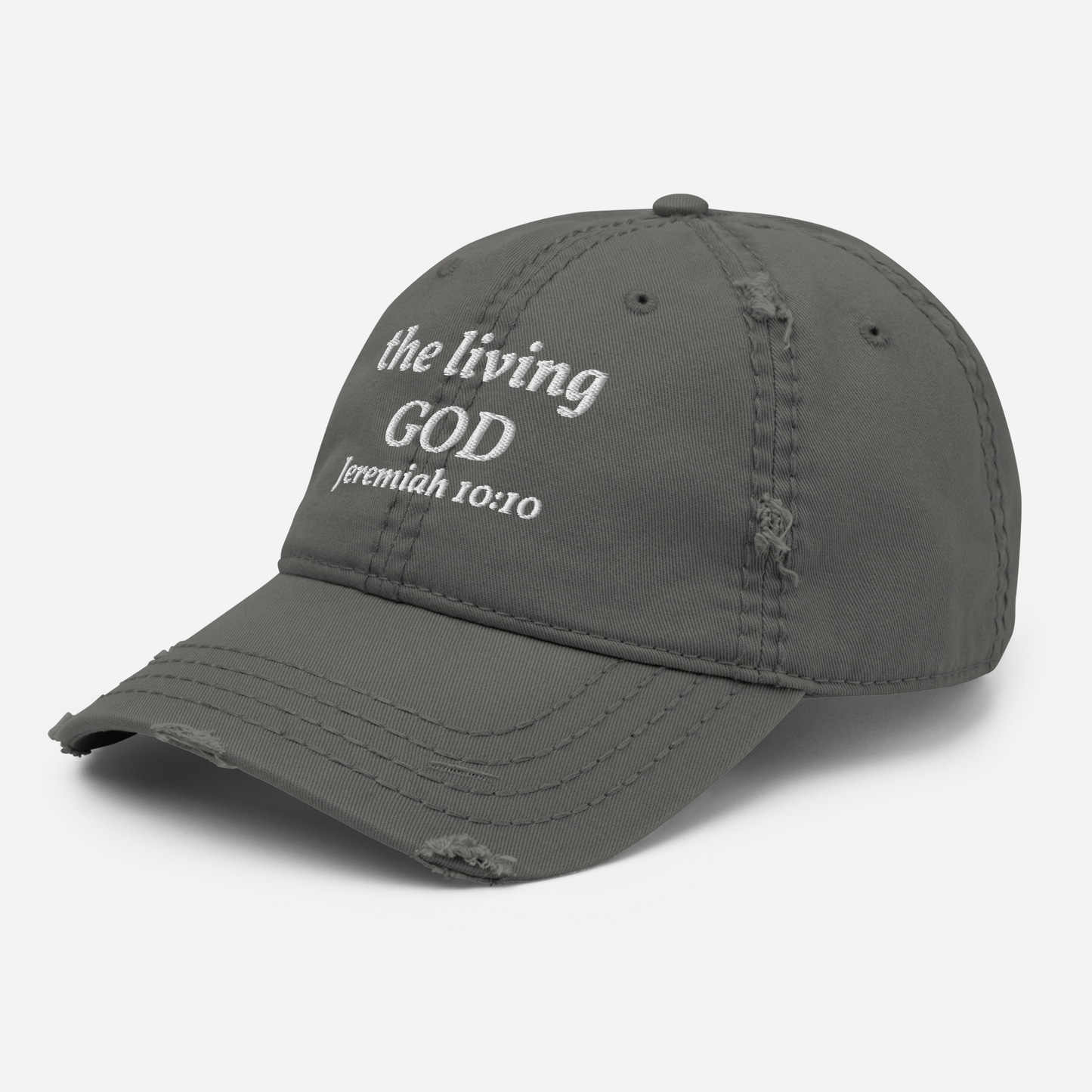 The Kingdom Mindset Dad Hat by My Store is a distressed gray adjustable cotton cap featuring white the living GOD Jeremiah 10:10 embroidery on the front, blending faith and style for daily wear.