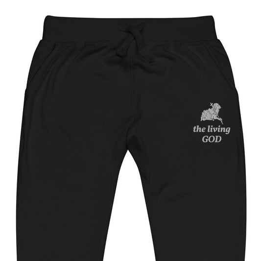Black lightweight fleece pants with Lamb logo and “the living GOD” text printed on thigh