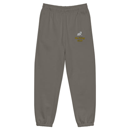 Gray heavyweight fleece sweatpants with Lamb logo and yellow “the living GOD” text on thigh.