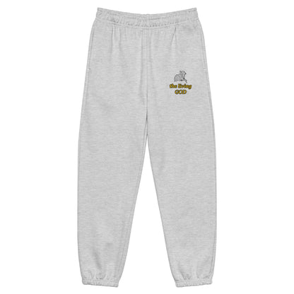Heather gray heavyweight fleece sweatpants with Lamb logo and yellow “the living GOD” text on thigh.