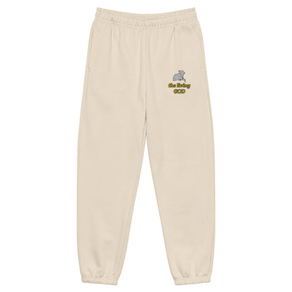 beige heavyweight fleece sweatpants with Lamb logo and yellow “the living GOD” text on thigh.