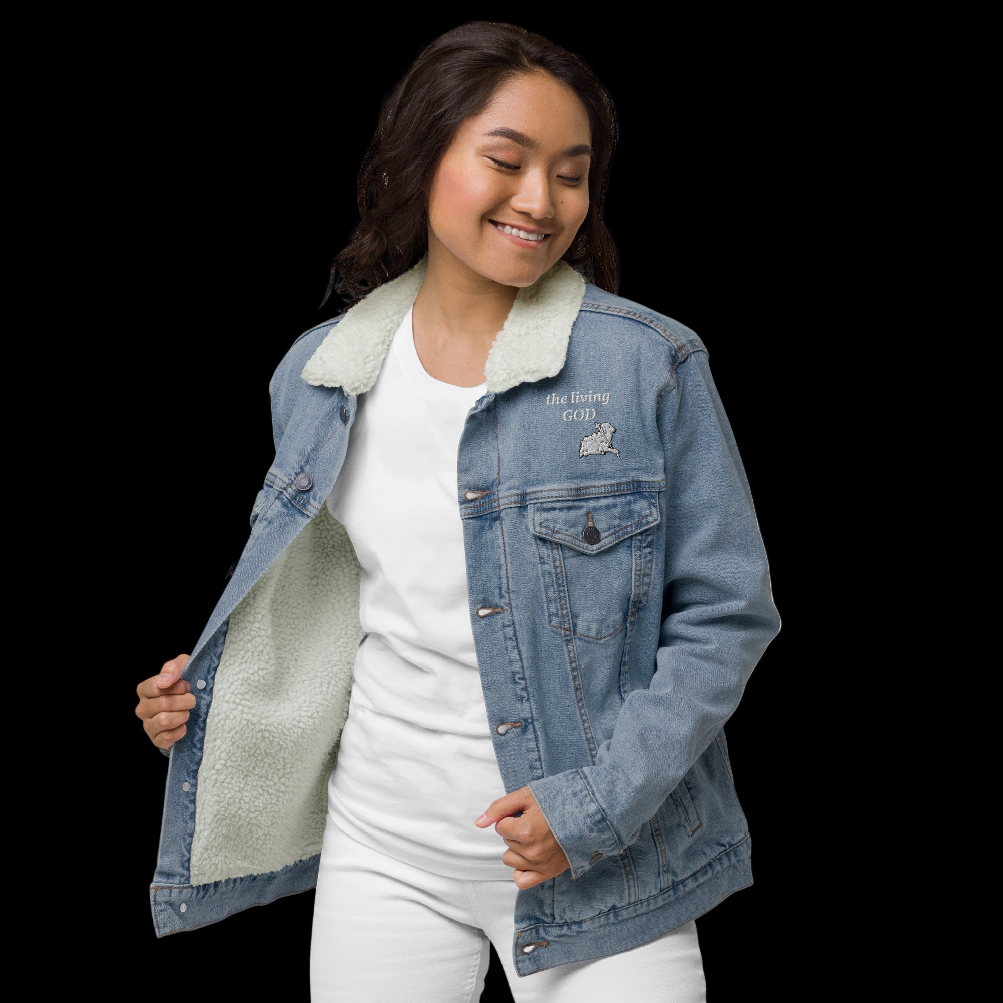 Woman wearing a denim sherpa jacket 
